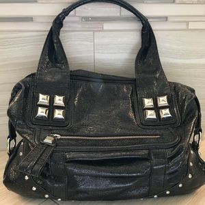 Kathy Van Zeeland large black faux leather handbag
